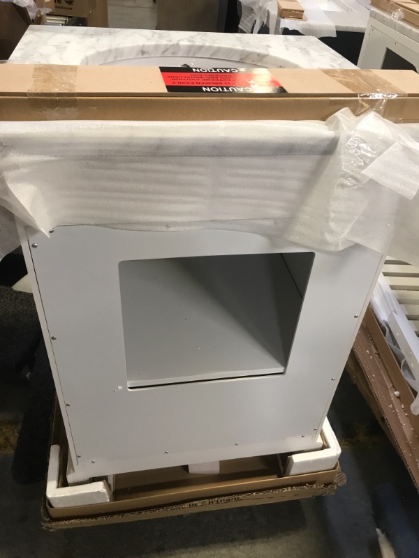 Photo 1 of 24 in. W x 22 in. D x 34 in. H Bath Vanity in White with Marble Vanity Top in Carrara White with White Basin

