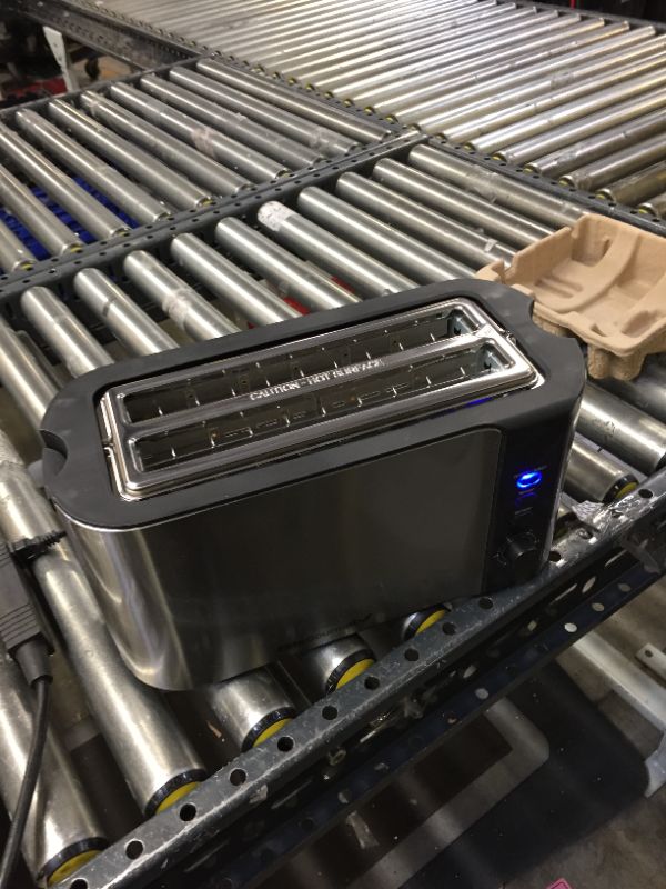Photo 1 of Elite Platinum Cool Touch Long Slot Toaster with Extra Wide 1.25" Slots for Bagels, 6 Settings, Space Saving Design, Warming Rack, 4 Slice, Stainless Steel & Black
