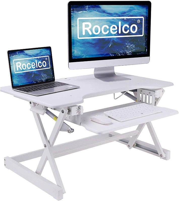 Photo 1 of Rocelco 32" Height Adjustable Standing Desk Converter - Sit Stand Computer Workstation Riser - Dual Monitor Retractable Keyboard Tray Gas Spring Assist - Black- Style: Riser Only


