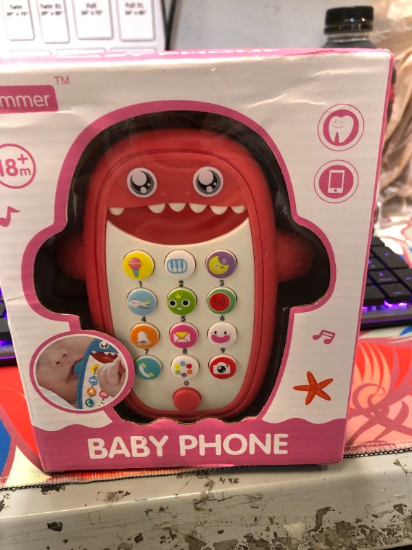 Photo 2 of Baby Shark Cell Phone Toy with Removable Teether Case, Light up, Music & Adjustable Volume Kids Play & Learn Fake Phone for Infant & Toddler, Preschool Birthday Gift for Girl Boy 18+ Months (Red)
