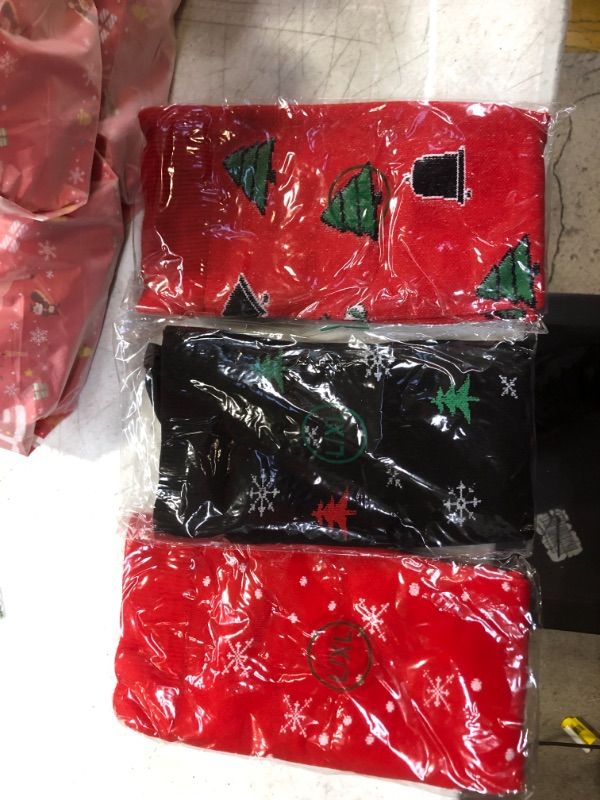 Photo 1 of bundle of large an xl Christmas socks pack bundle of 4 packs of 3