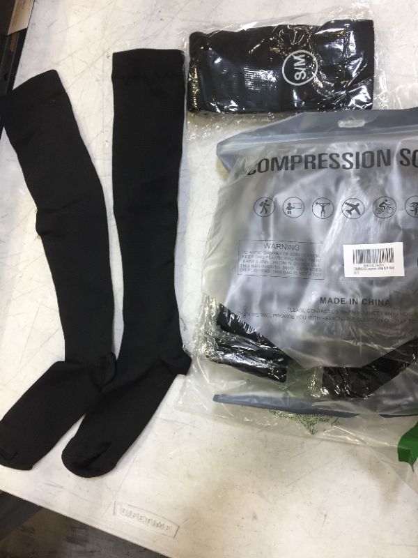 Photo 1 of COMPRESSION SOCKS BLACK SMALL/ MEDIUM 6 PK 