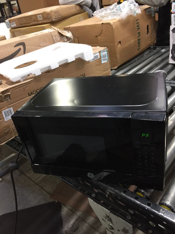 Photo 1 of GE JES1072DMBB Microwave Oven | 0.7 Cubic Feet Capacity, 700 Watts | Kitchen Essentials for the Countertop or Dorm Room Cu Ft, Black
