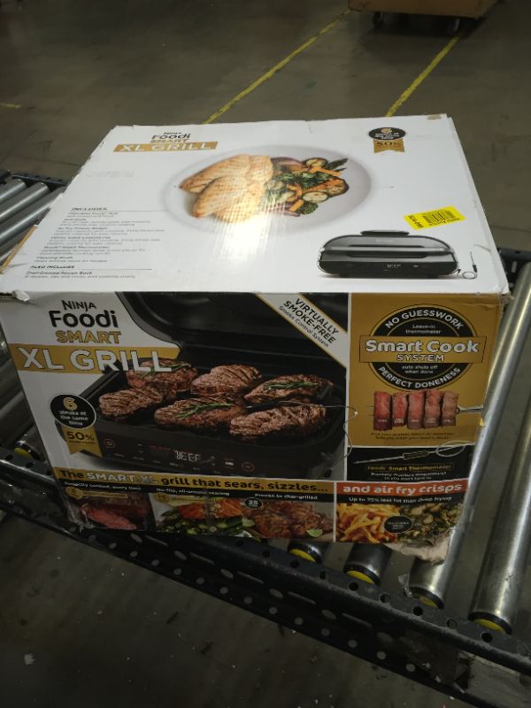 Photo 1 of Ninja FG551 Foodi Smart XL 6-in-1 Indoor Grill with Air Fry, Roast, Bake, Broil & Dehydrate, Smart Thermometer, Black/Silver
