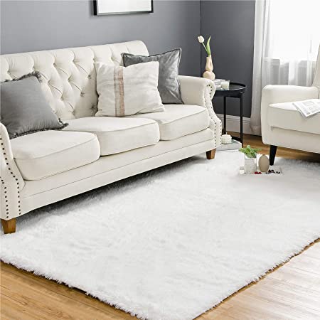 Photo 1 of 48"X64" WHITE FUR AREA RUG