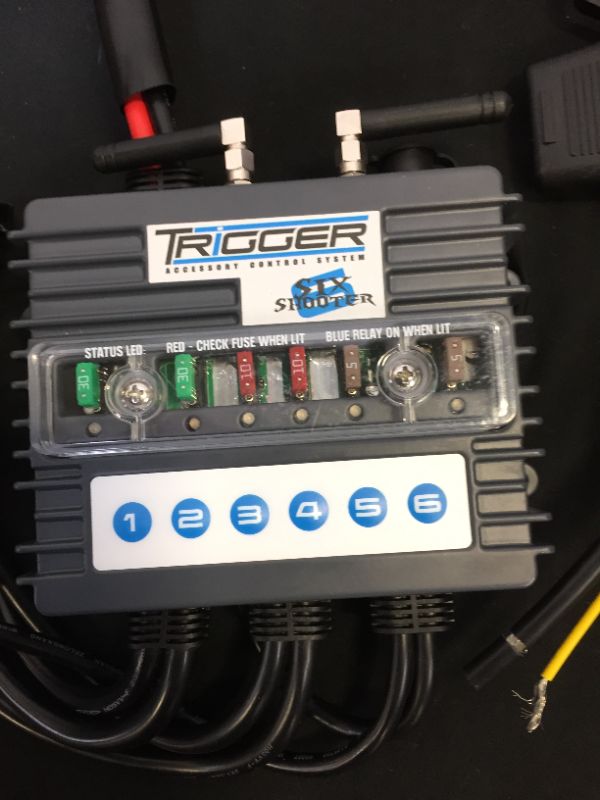 Photo 1 of TRIGGER 3001 Six Shooter Accessory Control System , Black
