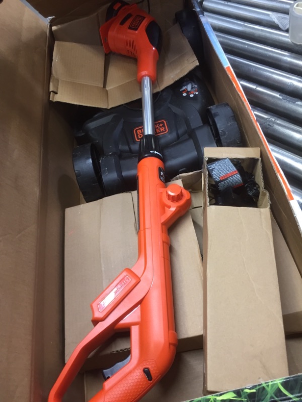 Photo 2 of Black & Decker MTC220 Max Cordless Lithium-Ion 3-in-1 Trimmer/Edger & Mower, Orange/ Black
MISSING Battery