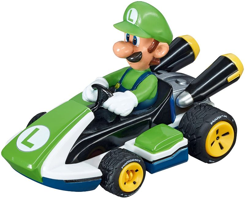 Photo 1 of Carrera 64034 Mario Kart - Luigi 1:43 Scale Analog Slot car Vehicle for GO!!! Electric and Battery Slot car Racing Track Sets
** missing charging cord & couple dings **