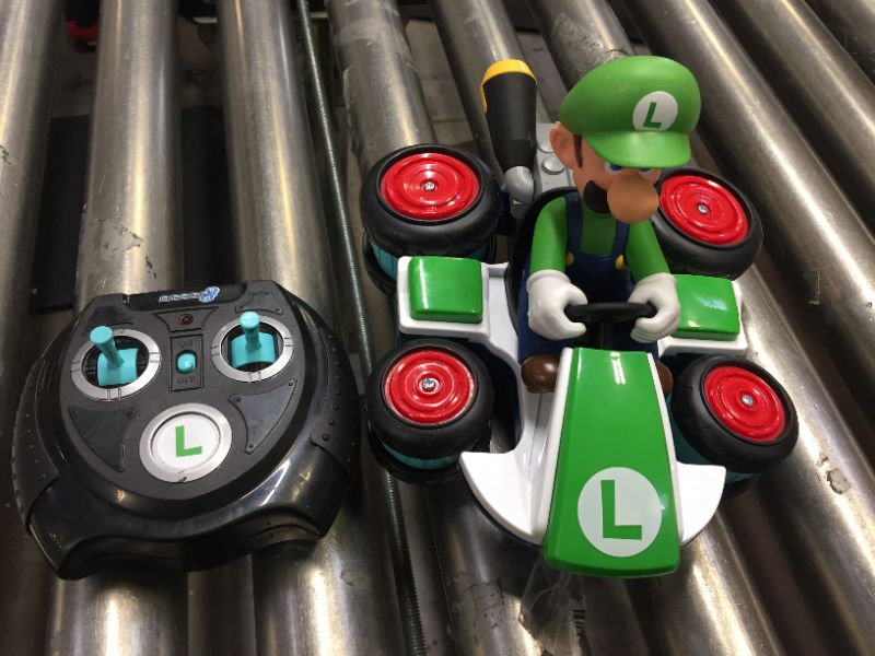 Photo 2 of Carrera 64034 Mario Kart - Luigi 1:43 Scale Analog Slot car Vehicle for GO!!! Electric and Battery Slot car Racing Track Sets
** missing charging cord & couple dings **