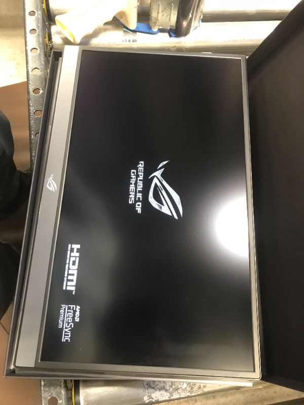 Photo 2 of ASUS ROG Strix XG17AHP 17.3” Portable Gaming Monitor INCLUDES CARRYING CASE AND BACKING, UNABLE TO TEST FOR DEAD PIXELS, TURNS ON. 