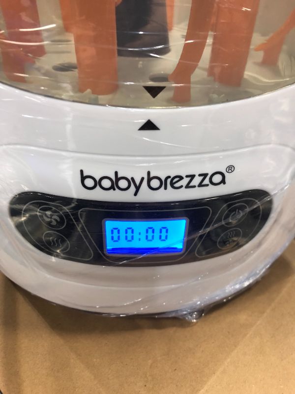 Photo 2 of Baby Brezza Baby Bottle Sterilizer and Dryer Machine – Electric Steam Sterilization - Universal Fit - Pacifiers, Glass, Plastic, and Newborn Feeding Bottles