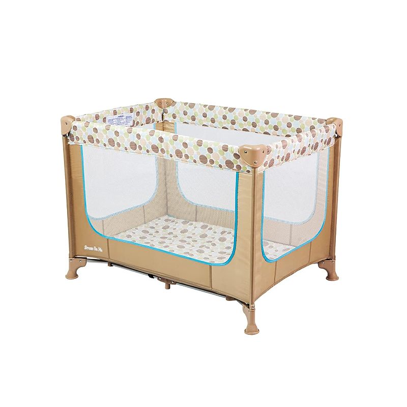 Photo 1 of Dream On Me Zodiak Portable Play Yard with Carry Bag and Shoulder Strap, Coffee and Blue