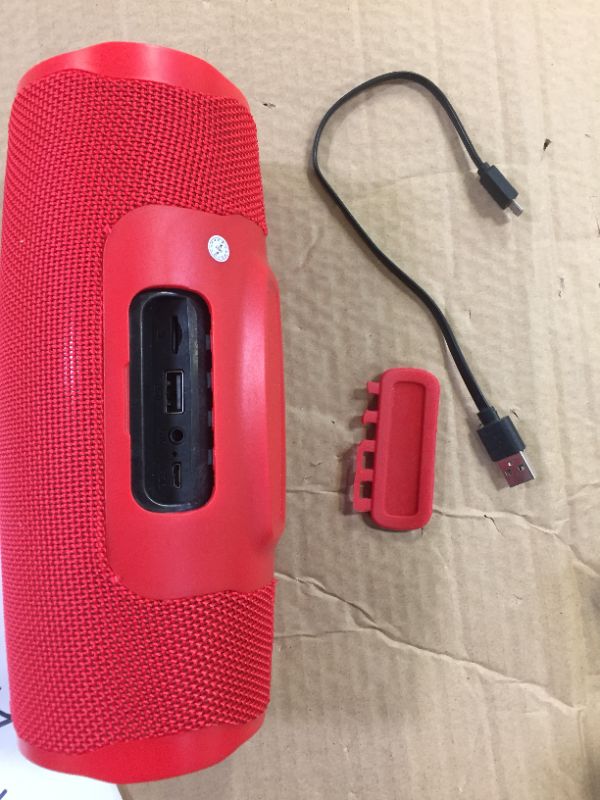 Photo 2 of JBL Charge 4 - Waterproof Portable Bluetooth Speaker - Red--unable to test needs to be charged and flap on the usb panel is broken off 
