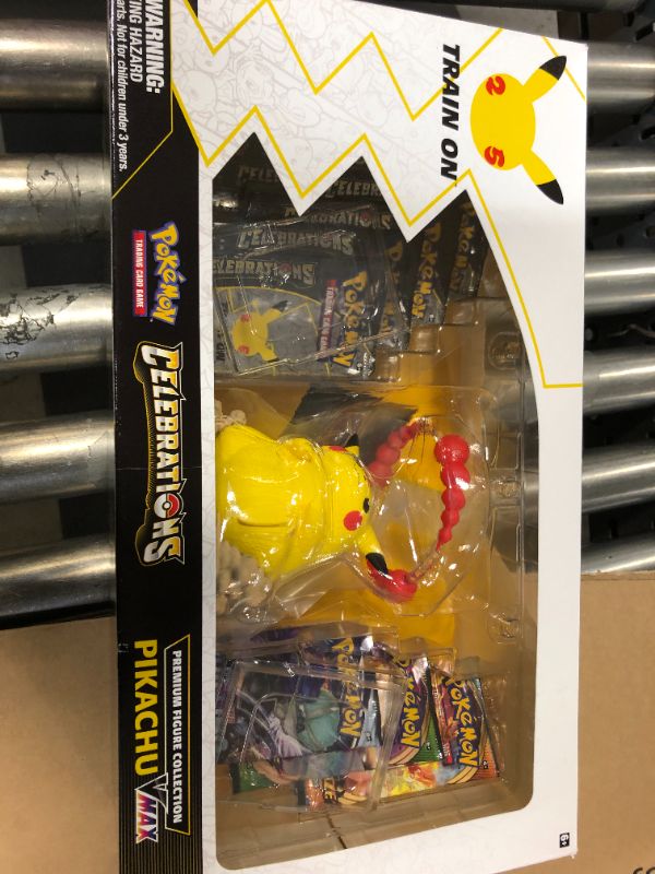 Photo 2 of Pokémon TCG Celebrations Premium Figure Collection Pikachu VMAX Box - 11 Packs
