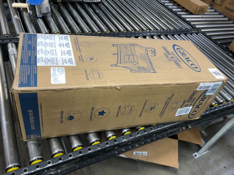 Photo 1 of Graco Pack 'n Play Change 'n Carry Playard with Bassinet