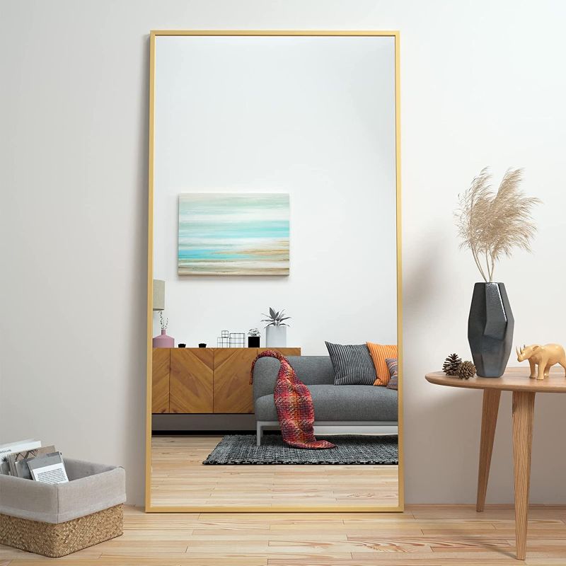 Photo 1 of CASSILANDO Full Length Mirror 65" × 24", Floor Big Mirror,Standing Mirror, Against Wall for Bedroom,Dressing and Wall-Mounted Thin Frame Mirror (Gold, 65x24)

