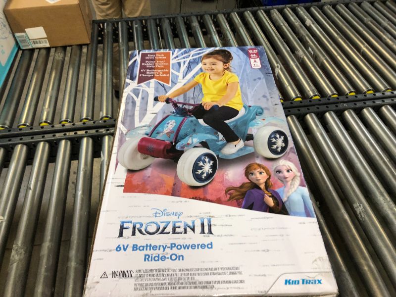 Photo 8 of Kid Trax Toddler Disney Frozen 2 Electric Quad Ride On Toy, Kids 1.5-3 Years Old, 6 Volt Battery and Charger Included, Max Weight 45 lbs, Frozen 2 Blue
