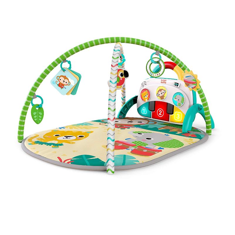 Photo 1 of Bright Starts 4-in-1 Groovin’ Kicks Piano & Drum Light-Up Baby Activity Gym Play Mat with 2 Toy Bars, Newborn to Toddler, Tropical Safari, Multicoloured
