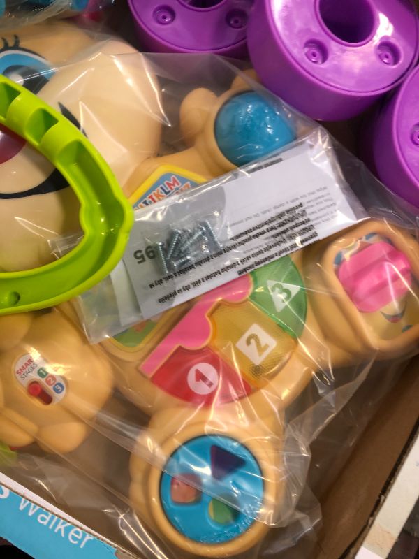Photo 1 of Fisher-Price Laugh & Learn Smart Stages Learn with Sis Walker, Musical Walking Toy for Babies and Toddlers Ages 6 to 36 Months
