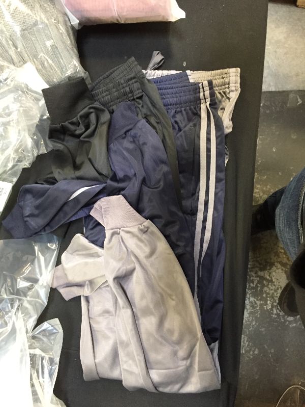 Photo 1 of bundle of medium sized joggers 