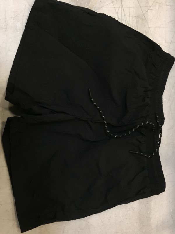 Photo 1 of a medium pair of black shorts 