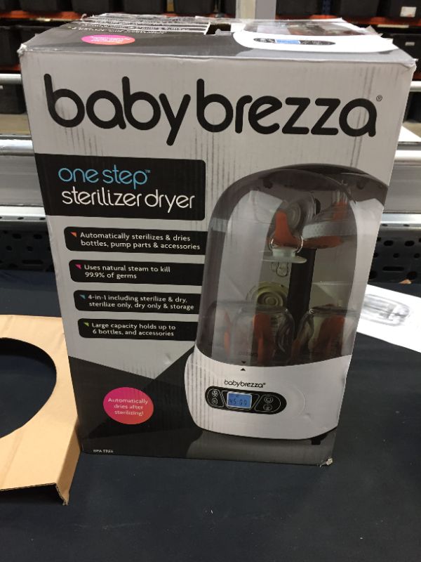 Photo 2 of Baby Brezza Baby Bottle Sterilizer and Dryer Machine – Electric Steam Sterilization - Universal Fit - Pacifiers, Glass, Plastic, and Newborn Feeding Bottles
