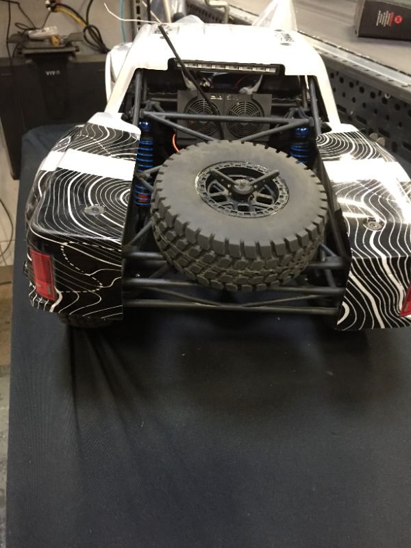 Photo 4 of Losi RC Truck 1/10 Black Rhino Ford Raptor Baja Rey 4WD Brushless RTR (Battery and Charger Not Included) with Smart, LOS03020V2T2
UNABLE TO TEST FUNCTIONALITY