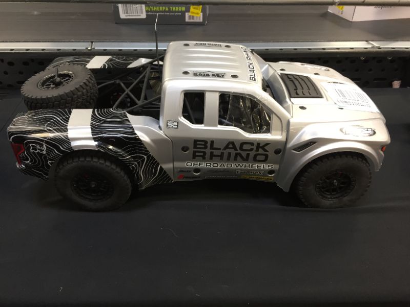 Photo 2 of Losi RC Truck 1/10 Black Rhino Ford Raptor Baja Rey 4WD Brushless RTR (Battery and Charger Not Included) with Smart, LOS03020V2T2
UNABLE TO TEST FUNCTIONALITY