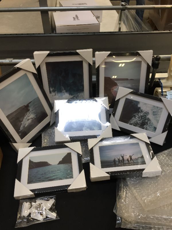 Photo 1 of ArtbyHannah 7 Pack Blue Ocean Gallery Wall Frame Set with Black Picture Frame Sets and Decorative Seascape Picture Frame Collage Set Wall Art Decor for Home Decoration, Multi Size: 8x10,6x8 Inch
