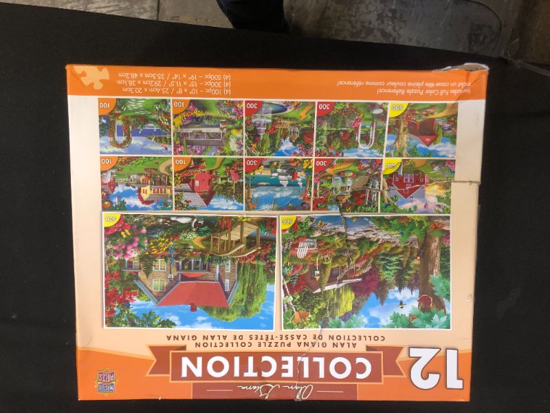 Photo 1 of collection of 12 100 pc puzzles 
