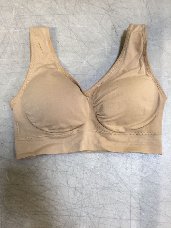 Photo 1 of BESTENA WOMENS NUDE WIRELESS BRA
SIZE MEDIUM