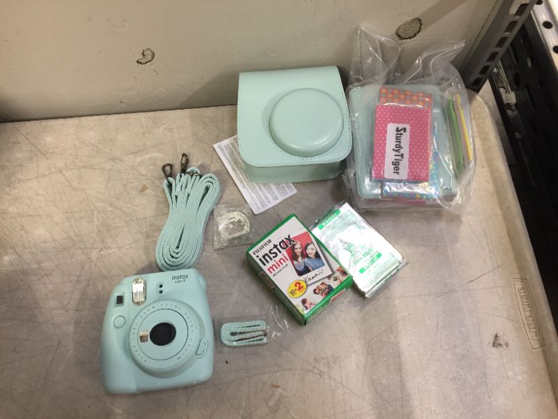 Photo 2 of Fujifilm Instax Mini 9 Instant Camera + Fujifilm Instax Mini Film (40 Sheets) Bundle with Deals Number One Accessories Including Carrying Case, Color Filters, Kids Photo Album + More (Ice Blue)

