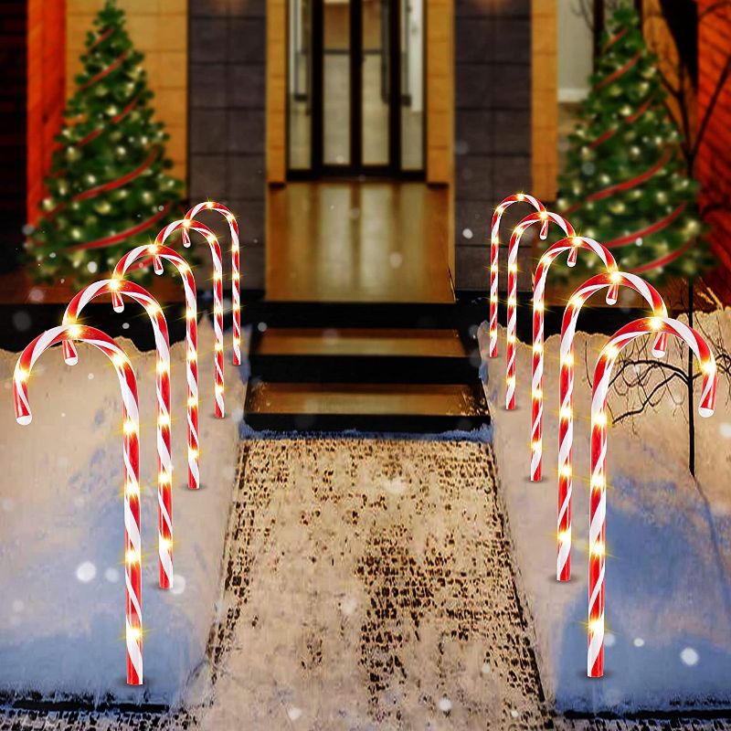 Photo 1 of Joiedomi 17" Christmas Candy Cane Pathway Markers, Set of 12 Christmas Pathway Lights with 72 Warm White Lights for Indoor and Outdoor Christmas Decorations
