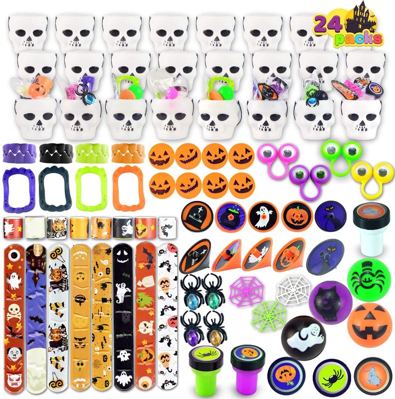 Photo 1 of Halloween Party Favors Set, 24 Pack Prefilled Skull Bucket with Halloween Themed Party Favors Including Halloween Stamps, Bouncy balls, Eyeballs, Vampire teeth, Tops, Spiders, Spider Webs, Slap Bracelets and Pumpkins for Kids Trick or Treat, Party Favors,