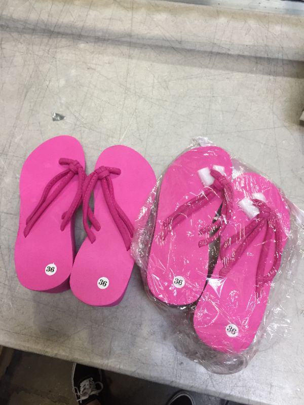 Photo 1 of 2 PACK OF PINK SIZE 5 SANDLES 