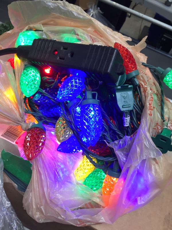 Photo 1 of 32.6 ft. 50-Light Multi Color LED C9 Light Set on Spool