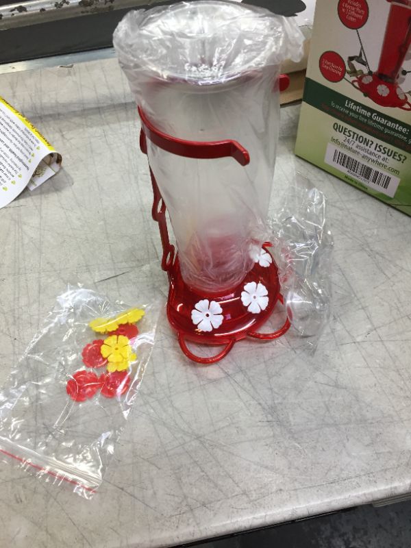 Photo 1 of Anywhere Window Hummingbird Feeders for Outdoors Including 3 Colors of Interchangeable Flowers for Hummingbirds Food, Sugar Water and Nectar