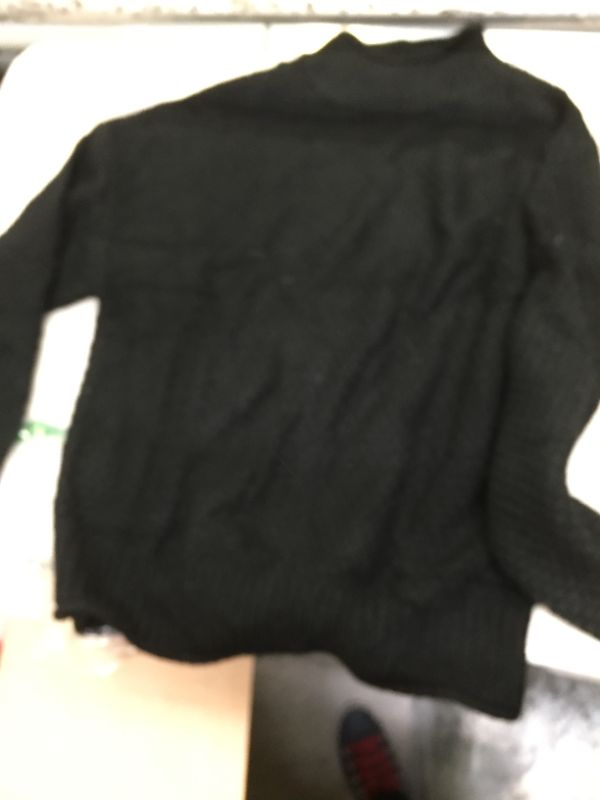 Photo 1 of black knitted sweater
m/l