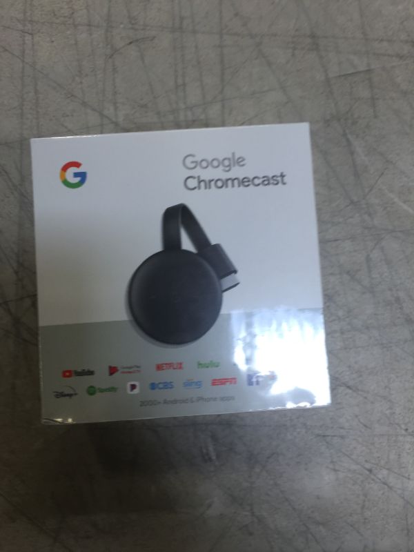 Photo 1 of Google Chromecast - Streaming Device with HDMI Cable - Stream Shows, Music, Photos, and Sports from Your Phone to Your TV
