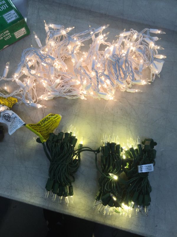 Photo 1 of 29.5 ft. 100-Light LED Mini Warm White String Light with Green Wire Christmas De And Home Accents Holiday 150-Light Clear String-to-String White Wire Light Set