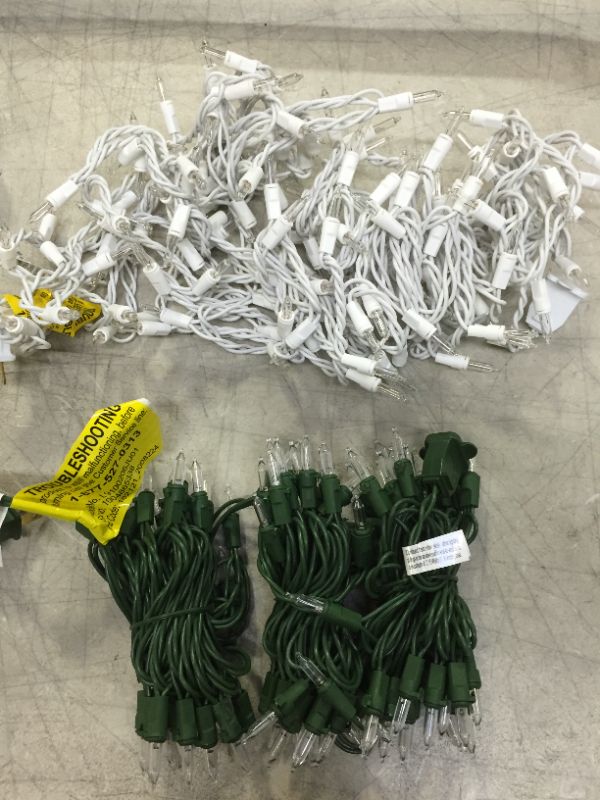 Photo 1 of 29.5 ft. 100-Light LED Mini Warm White String Light with Green Wire Christmas De And Home Accents Holiday 150-Light Clear String-to-String White Wire Light Set