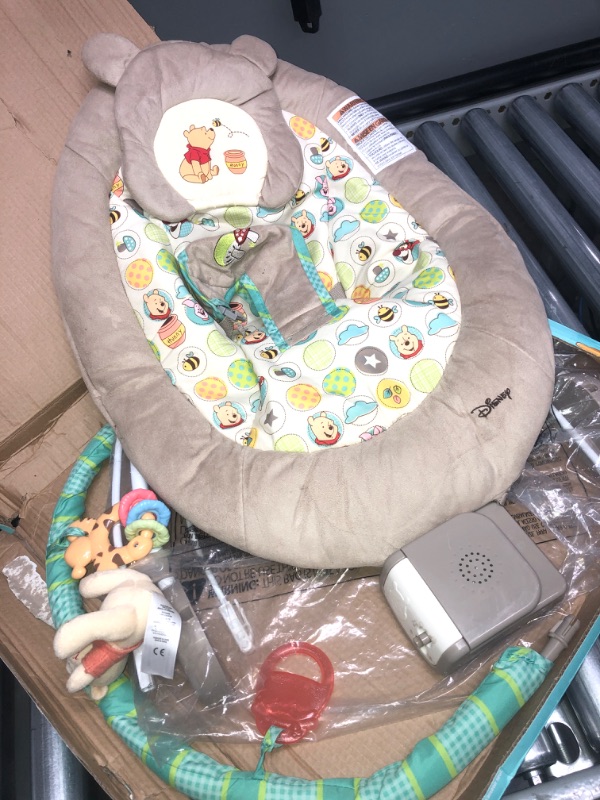 Photo 2 of Bright Starts Disney Baby Winnie the Pooh Dots & Hunny Pots Vibrating Baby Bouncer
