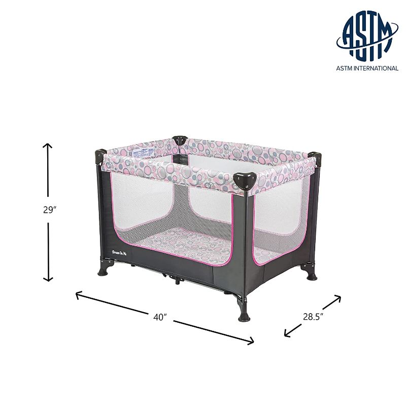 Photo 1 of Dream On Me Zodiak Portable Playard with Carry Bag and Shoulder Strap, Grey/Pink, Small
