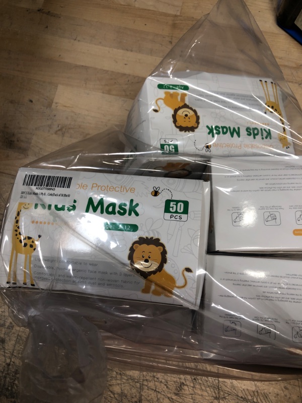 Photo 1 of Kids face mask, 50 pcs., 5 boxes, one of the boxes is damaged, but the product inside of the box is not.