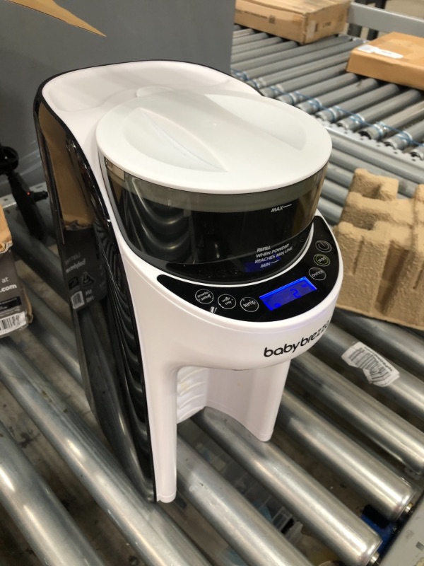 Photo 1 of New and Improved Baby Brezza Formula Pro Advanced Formula Dispenser Machine - Automatically Mix a Warm Formula Bottle Instantly - Easily Make Bottle with Automatic Powder Blending
