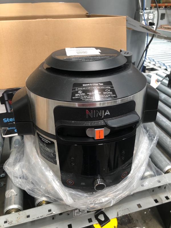 Photo 3 of Ninja OL501 Foodi 6.5 Qt. 14-in-1 Pressure Cooker Steam Fryer with SmartLid, that Air Fries, Proofs & More, with 2-Layer Capacity, 4.6 Qt. Crisp Plate & 25 Recipes, Silver/Black
