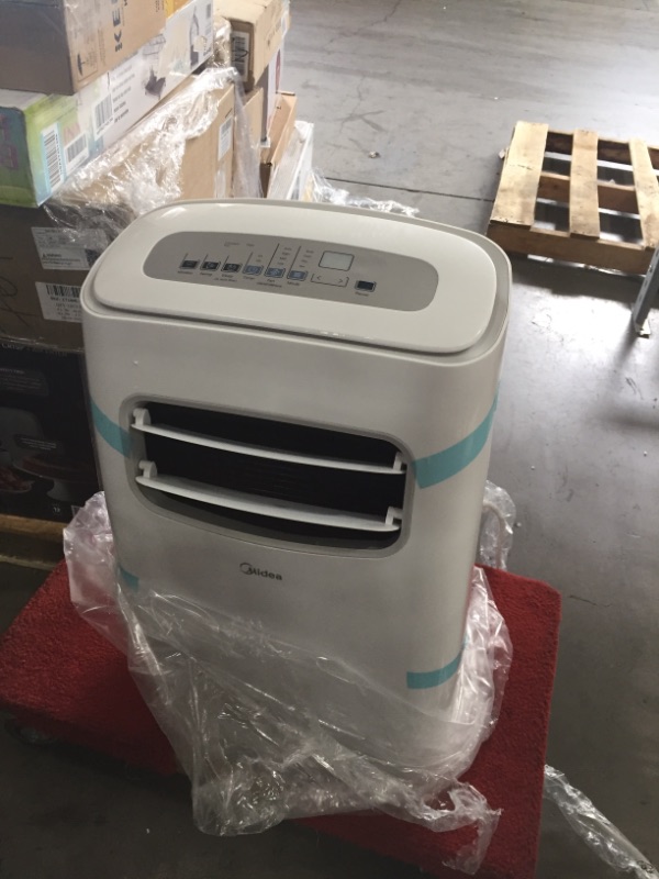 Photo 2 of UNABLE TO TEST* POWER CORD DAMAGED*
Midea 10,000 BTU (5,800 BTU SACC) Portable Air Conditioner, Cools up to 200 Sq. Ft., Works as Dehumidifier & Fan, Wi-Fi Enabled, Control with Remote, Amazon Alexa & Google Assistant
