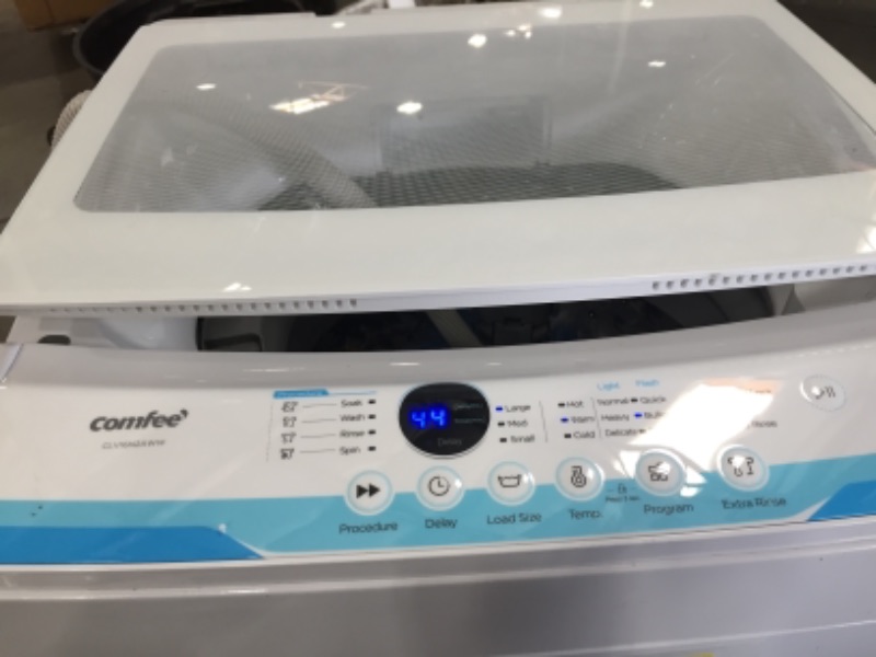 Photo 2 of TURNS ON* DENTED IN THE FRONT*
COMFEE’ 1.6 Cu.ft Portable Washing Machine, 11lbs Capacity Fully Automatic Compact Washer with Wheels, 6 Wash Programs Laundry Washer with Drain Pump, Ideal for Apartments, RV, Camping, Ivory White
