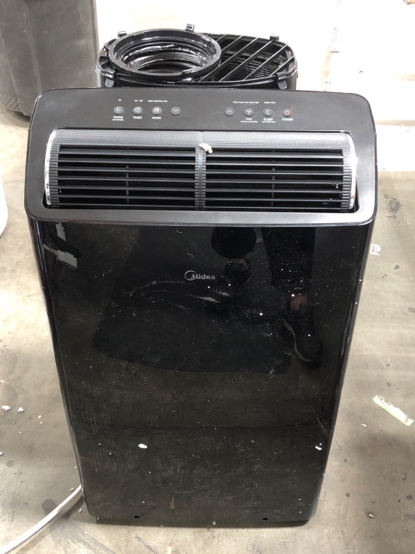 Photo 2 of USED: Midea Duo 14,000 BTU (12,000 BTU SACC) Smart HE Inverter Ultra Quiet Portable Air Conditioner With Heat-Cools Up to 550 Sq. Ft., Works With Alexa/Google Assistant, Includes Remote Control & Window Kit 19.53 x 16.73 x 34.48 inches

