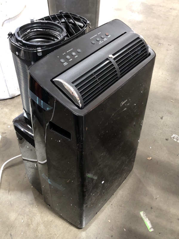 Photo 6 of USED: Midea Duo 14,000 BTU (12,000 BTU SACC) Smart HE Inverter Ultra Quiet Portable Air Conditioner With Heat-Cools Up to 550 Sq. Ft., Works With Alexa/Google Assistant, Includes Remote Control & Window Kit 19.53 x 16.73 x 34.48 inches

